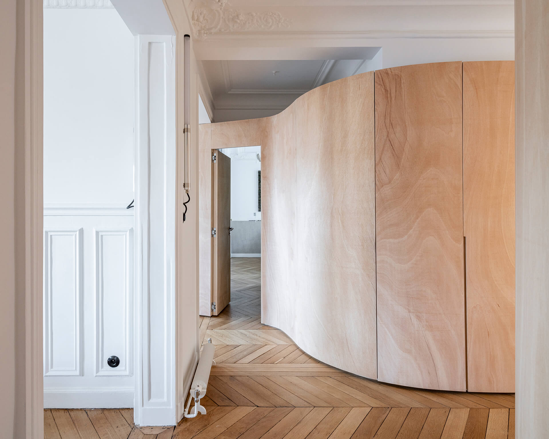 Frame Why This Parisian Apartment Eschews Walls For Curved Wooden Partitions