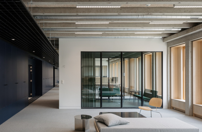 The old façade was replaced a new energy efficient one constructed of prefabricated wooden elements which are clad in aluminium. - Stijn Bollard