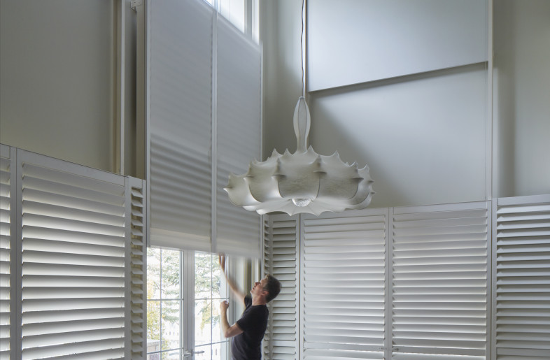 Louvers transition to full closed position. - James Brittain Photography