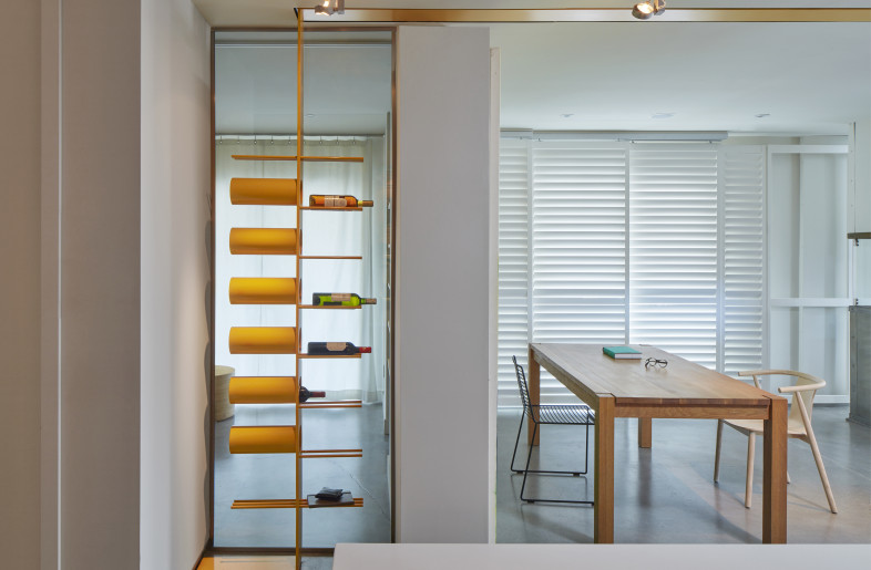 Colour stripe becoming custom made accessory, a wine rack. - James Brittain Photography