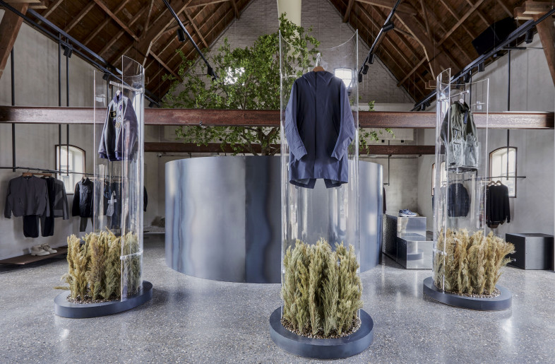 At the front of the store, customers are shown the best of the collection with floating glass display cylinders filled with hay. - Sarah Wijzenbeek