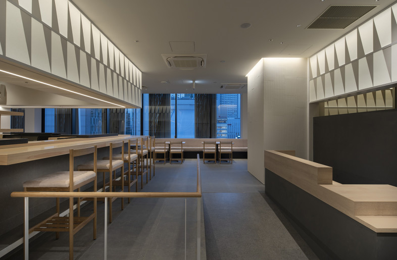 An evening view. Throughout the interior, LED lighting is used. In addition, glareless downlights create a cozy dining environment while “floating” the luminous walls to the foreground. - Keishiro Yamada