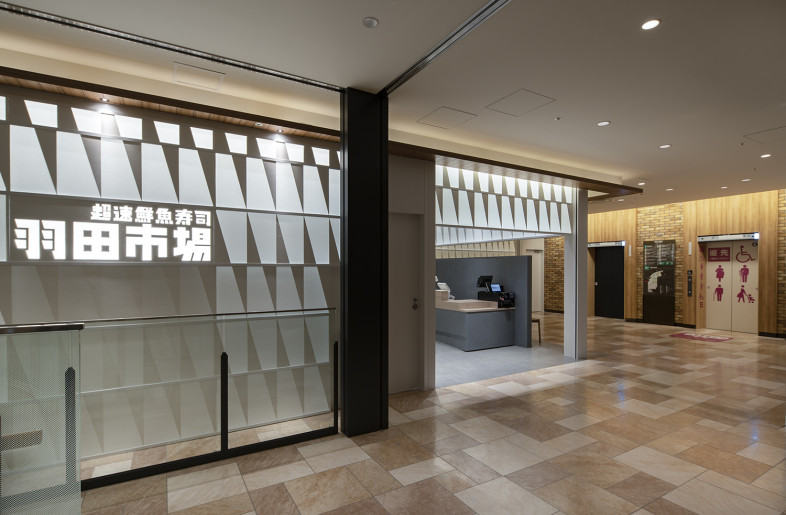 Clad with luminous wall panels, the facade is composed on partitions and hanging walls. - Keishiro Yamada
