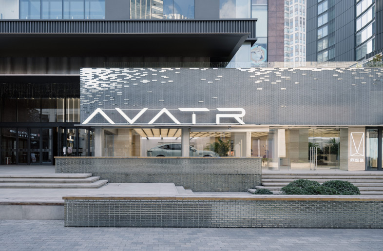Fully transparent facade allows the interior to be both visually and physically integrated with the  street plaza in OCN ,Shanghai - Wen Studio