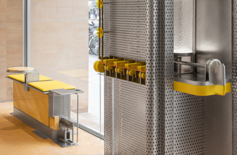 It connects to its surroundings through a façade extension built into the street, creating a transitional space. - SFAP