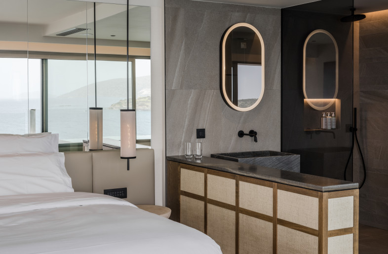 A palette of natural materials and maximised views of the Cretan coastline continue the architectural concept from the exterior through to the interior of the building. - Rasmus Hjortshøj