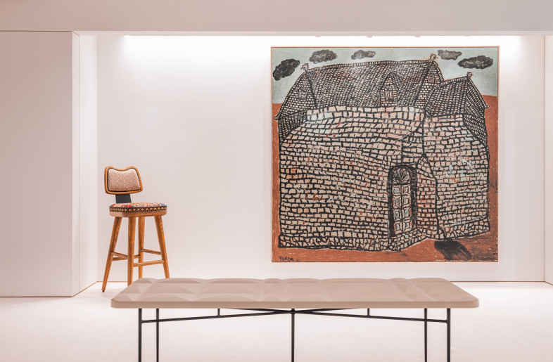 ‘Rumah Hitam’ painting by Yunizar adorn the gallery walls alongside a bench and ‘Vanimal’ barstool by via. - Kenneth Chao