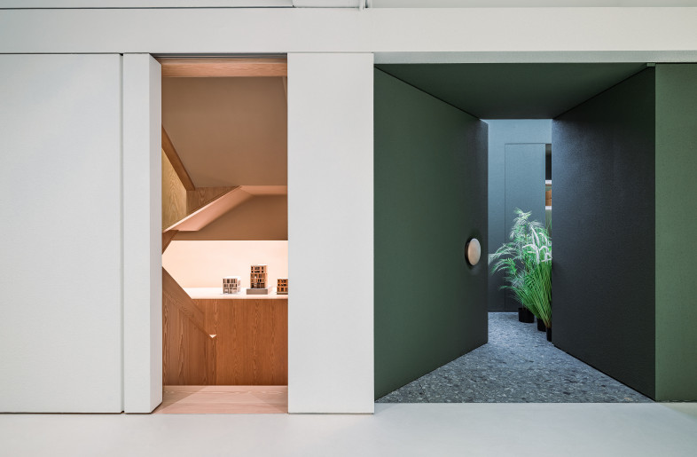 Sliding and swing doors allow the upper floor of the studio to become a standalone exhibition and events venue. - Kenneth Chao