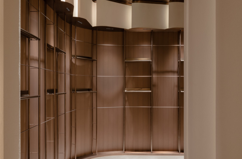 a display wall for accolades and keepsakes - Wen Studio