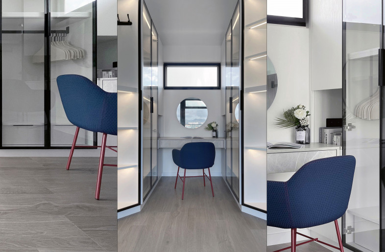 It was designed in gray marble, standing out entirely from the layout of the large wardrobes on each side, elegant and straightforward. - Frank Lo