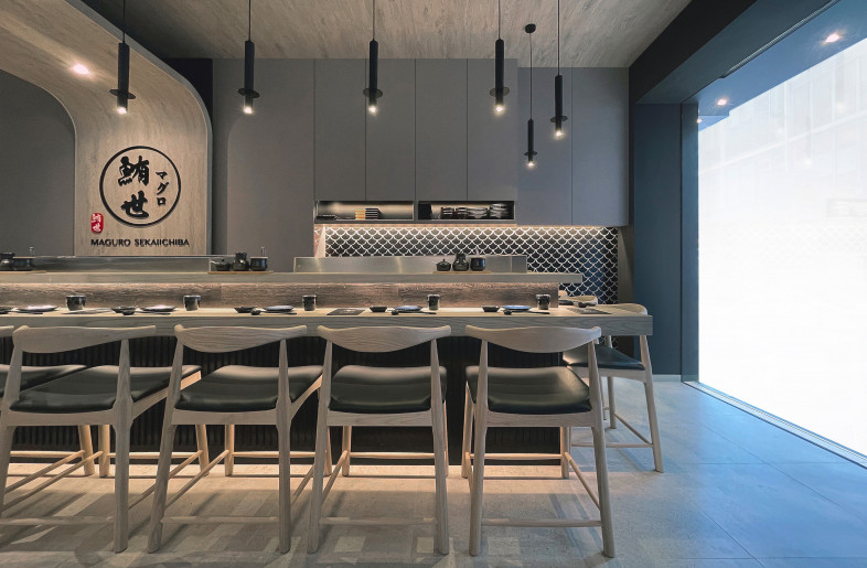 The esigner also designed the cabinets in the bar area in the shape of a kimono, which appears to embrace the bar area with open arms. - Frank Lo