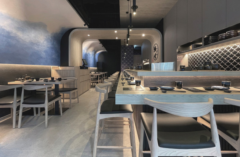 The dining area features an eight-meter-long wall designed to look like a wave and impress diners from the moment they enter. Wave-like effects are caused by the gradual blurring of blue and white areas in Italian art paint. - Frank Lo