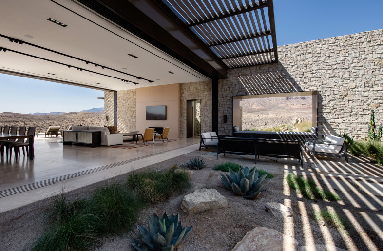 Unobstructed convergence of the indoor and outdoor environments achieved with pocketing Otiima doors. - Stephan Morgan