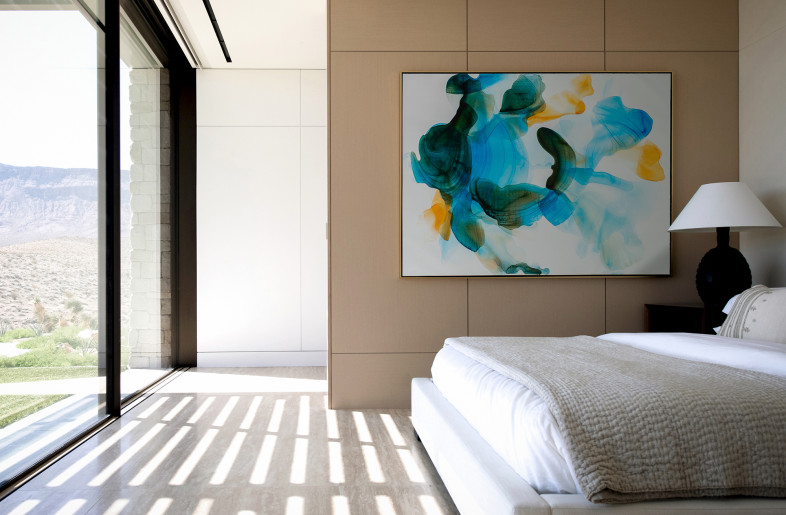 Primary bedroom  with views to rear pool deck and surrounding foothills. - Daniel Joseph Chenin, Ltd.