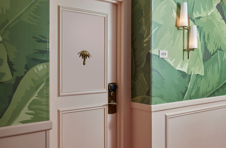 ach door has a gold-plated peephole with objects that ode to Palm Beach Gardens, such as the bayan tree. - Mike Schwartz
