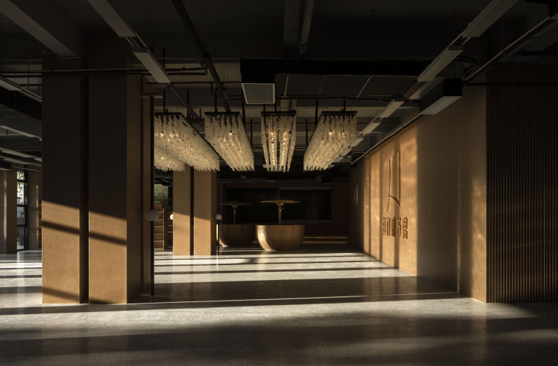 The back foyer - exhibition area with custom handmade chandelier with local seashell - YinXiang Photography