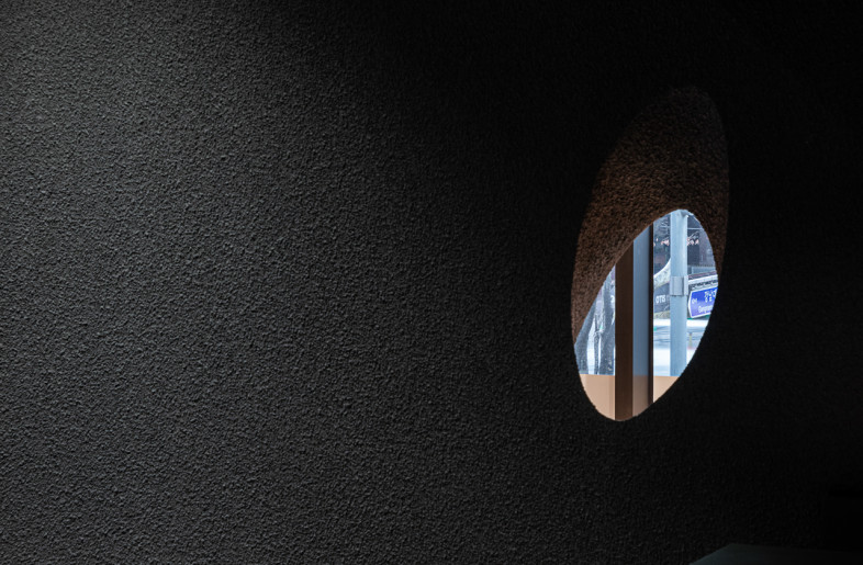 This interesting wall actively establishes how a general commercial space interacts with the outside of the store. Various senses related to food, such as sight, smell, light, and sound, are exchanged through the holes surrounding the store. - texture on texture