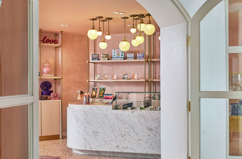 Explore the custom pink flamingo floor mosaic in the specialty chocolatier shop. - Mike Schwartz