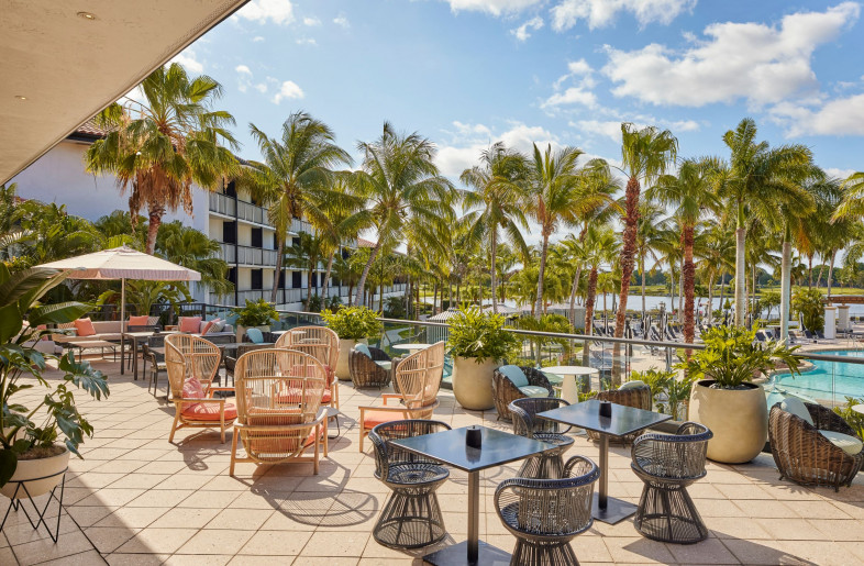 Spend some time overlooking the pool on rattan chairs. - Mike Schwartz
