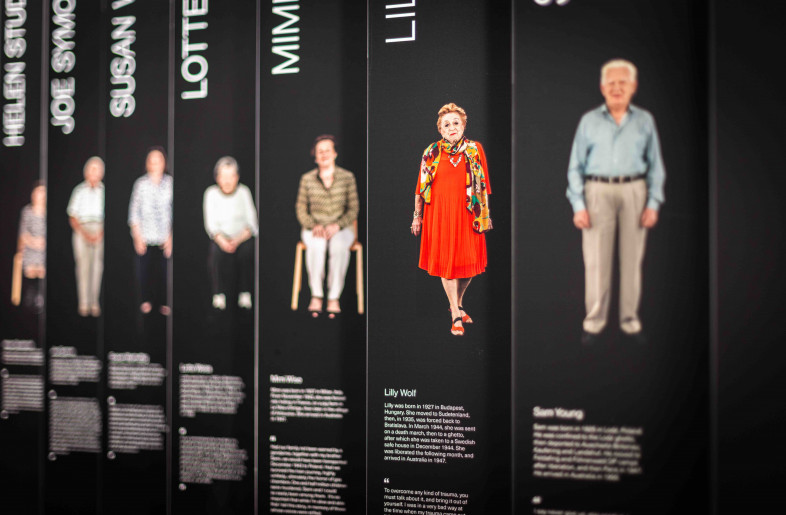 Lenticular with large graphic and images on one side, and specific stories on the other - Sydney Jewish Museum