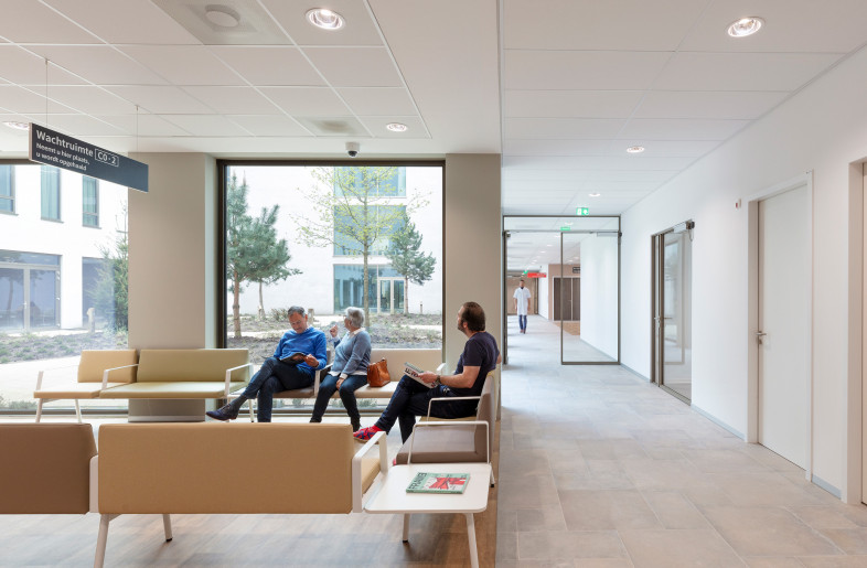 Waiting room for the outpatient clinic with a view of one of the patios - Hanne van der Woude