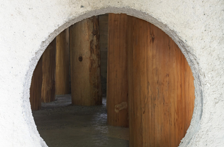 The 126-sq-m space is entered through a small porthole cut from a concrete wall. - Edmund Sumner