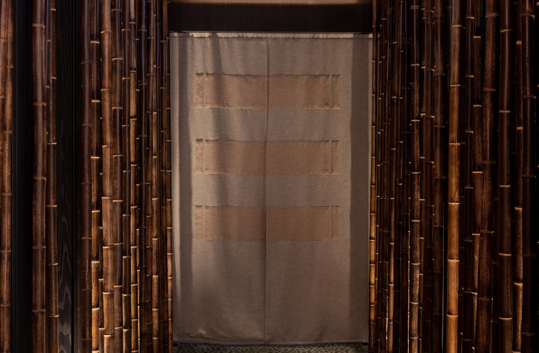 The tactile experience of our forest green pebble floor - Steven Ko Interior Photography