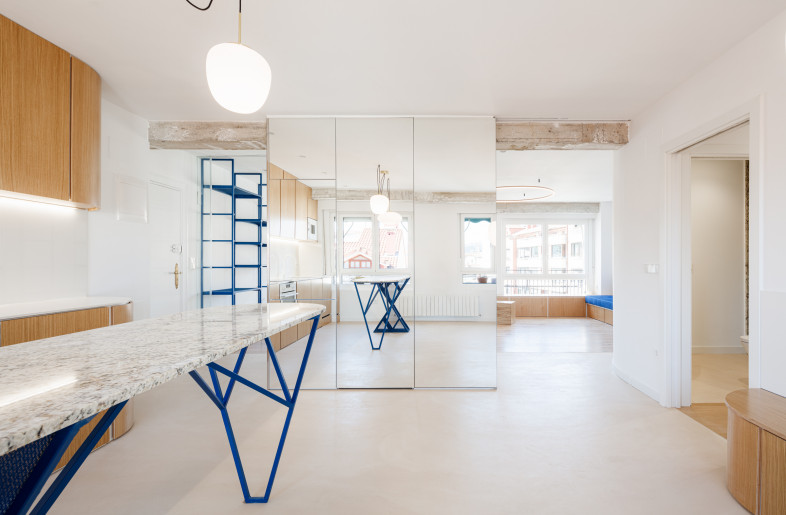 ELE Arkitektura renovated a 103-sq-m home in Durango, Basque Country, Spain, reimagining the original, compartmentalized floor plan to create a space without corridors and accommodate the occupants’ storage needs. - Aitor Estevez