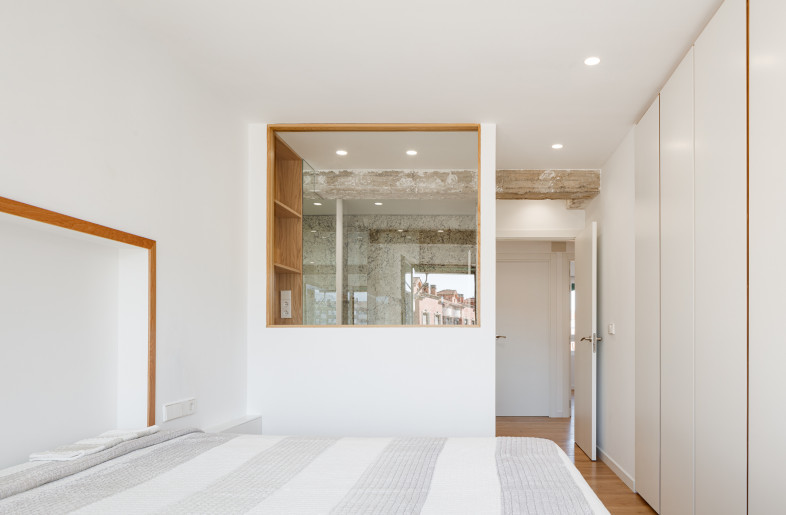 A second bathroom integrated into master bedroom, where the same material language employed in the bathroom as the rest of the space, with blue accents and granite surfacing. - Aitor Estevez
