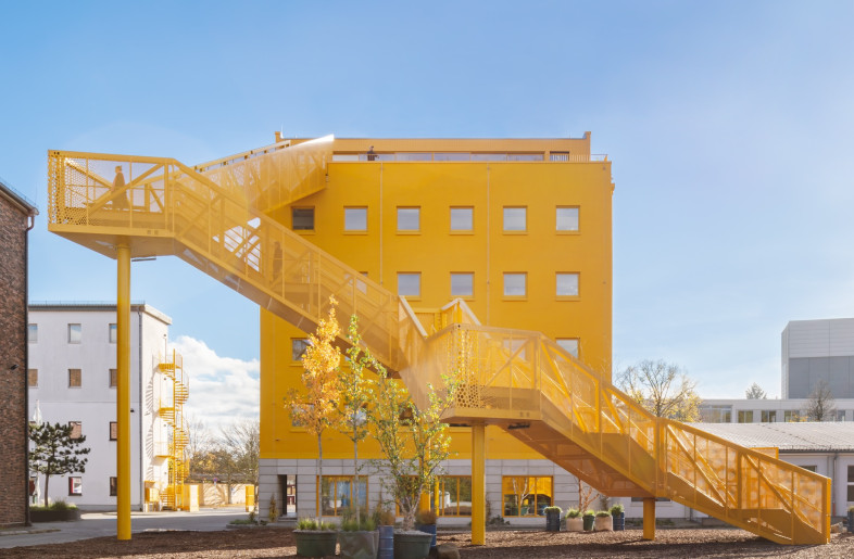 As part of a greater effort to revive the historic film studios Berliner Union Film Ateliers, a six-acre campus in Berlin, MVRDV converted the former media production facility into a mixed-use site. - Schnepp Renou