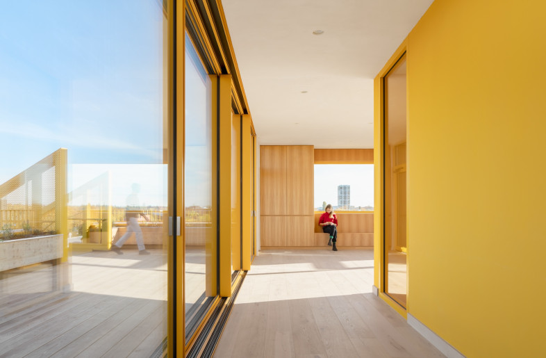 Wood finishes are mixed with intentionally untreated and exposed drywall for the low-impact fit-out. - Schnepp Renou