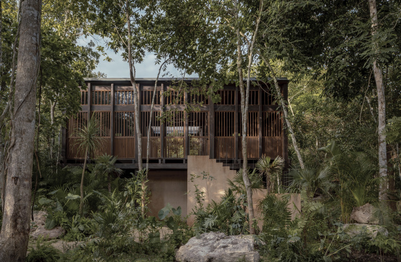 Boca de Agua, located by the Laguna de los Siete Colores (Lagoon of the Seven Colours) in Yucatán, Mexico, comprises several buildings raised on stilts. - César Béjar