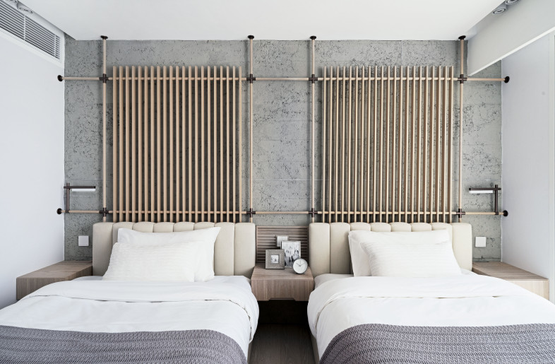 This relaxing guest room is designed for occasional visits by their parents. - Millimeter Interior Design Limited