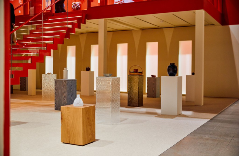 A gallery-like space with display pedestals of different sizes made with different materials showcased different design and craft products. - Katri Kapanen