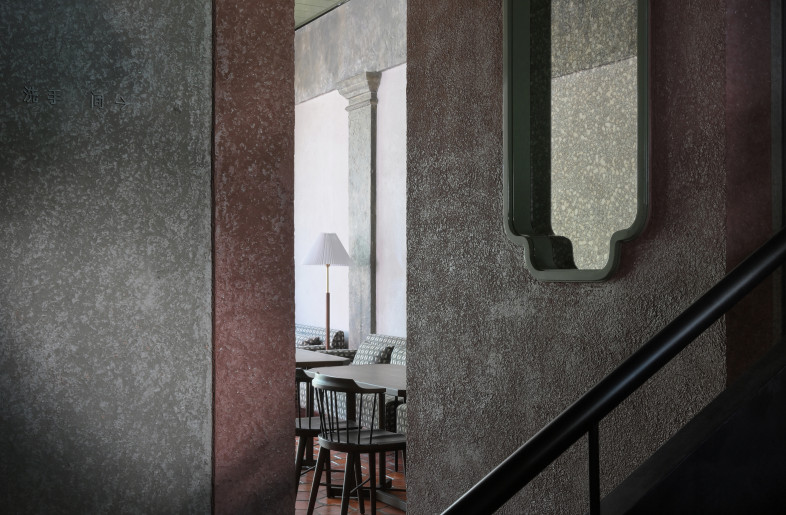 Formal language is the incessant whisper of the main space, a tell-tale of the unifying theme.  Against the deep and serene backdrop, mette metals and antique mirrors in the rendering of indirect lighting draw visual attention and retain perception in the serene order of antique aesthetics manifested in geometric contours. - Xiaodong Xu