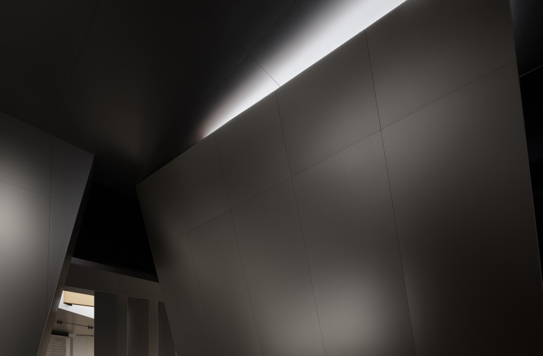 The interplay of light and cutting creates a unique balance of tension and dynamics. - Interior