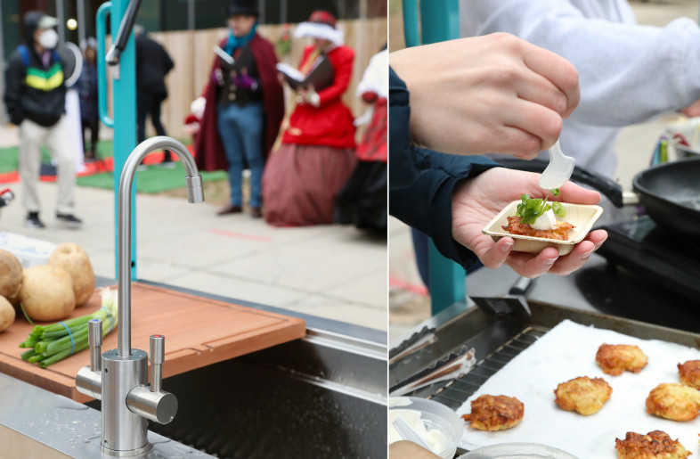 Holiday farmers market demonstrating food preparation. - Liz Gorman