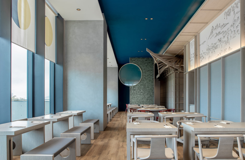 A large “Moon” hovers above as a projection screen for special events - Nirut Benjabanpot
