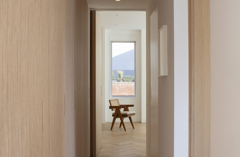 Hallway view toward primary bedroom - Beatrice Pediconi