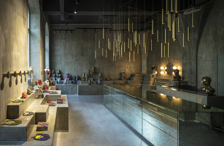 The pendant lights and the island create a centerpiece to bind the whole space together. - Niveditaa Gupta