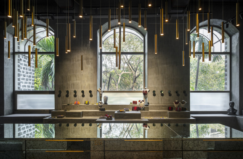 A trio of massive arched windows on the East wall flood the space with daylight - Niveditaa Gupta