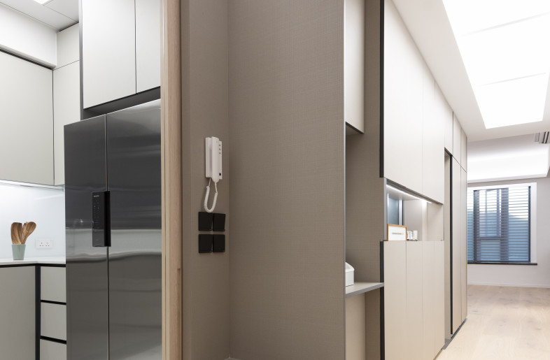 Designed for a multi-generational family of six, this spacious 5,000 sqf, eight-bedroom duplex combines three properties into a single connected home, creating a comfortable space for the family members to reside together while enjoying ample space and privacy. - Clifton Leung Design Workshop