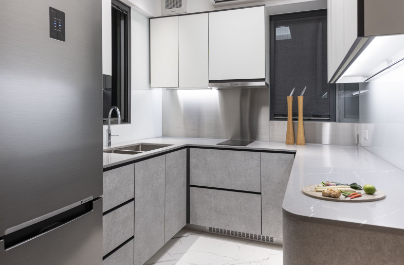 Designed for a multi-generational family of six, this spacious 5,000 sqf, eight-bedroom duplex combines three properties into a single connected home, creating a comfortable space for the family members to reside together while enjoying ample space and privacy. - Clifton Leung Design Workshop