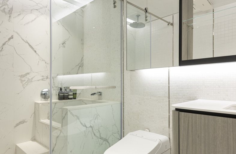 Japanese-style soaking tubs bring a touch of luxury to every bedroom. - Clifton Leung Design Workshop