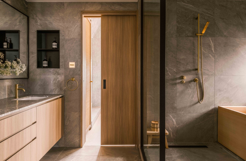 The bathroom opens to the study on one side and to the master bedroom on the other.  The tranquil bathroom becomes a part of the looping path. - Common Studio