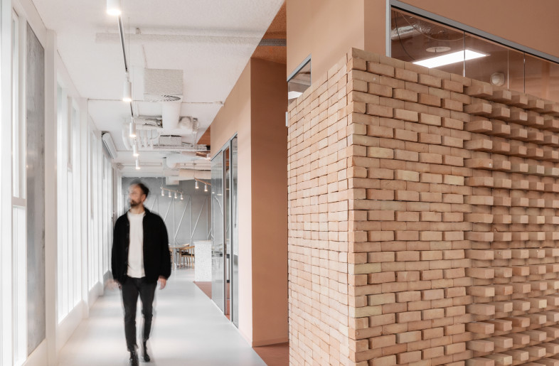 Central to the design is a versatile space nestled between brick walls, providing stability while honouring traditional Dutch architecture. - Giovanni Nardi