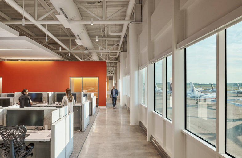 Each workstation area provides excellent views to the existing tarmac and decommissioned planes. - Ryan Gobuty