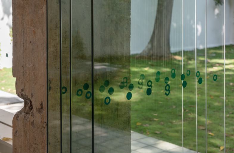Both ends of the pet social space are enveloped by large glass partitions and glass folding doors. When these doors are fully opened, the adjacent garden merges with the indoor activity area immediately. - @Chao Zhang