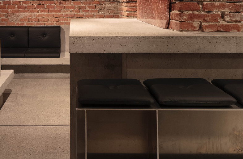 historic brick, black 3-phase rail, polished and sealed concrete, red marble, untreated aluminum, black leather - Kim Fohmann