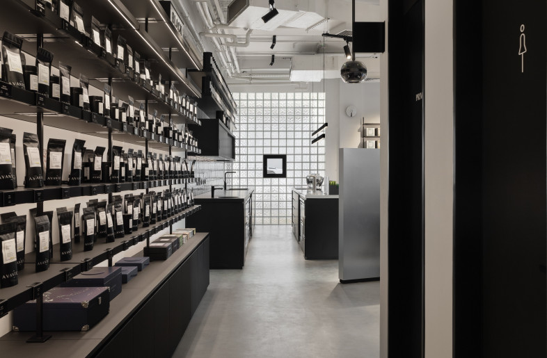 view into the back area of the cafe with all retail displays - Natelee Cocks, Photography